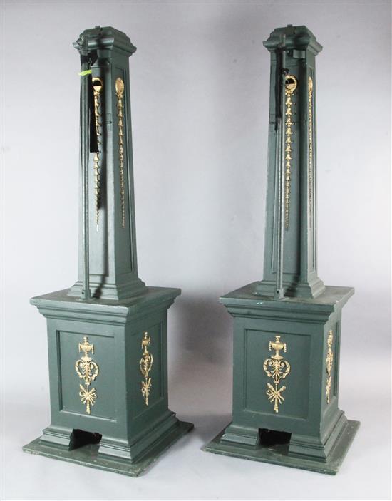 Four large bottle green and gilt painted square based lighting pillars specially made to mount electric spotlights
